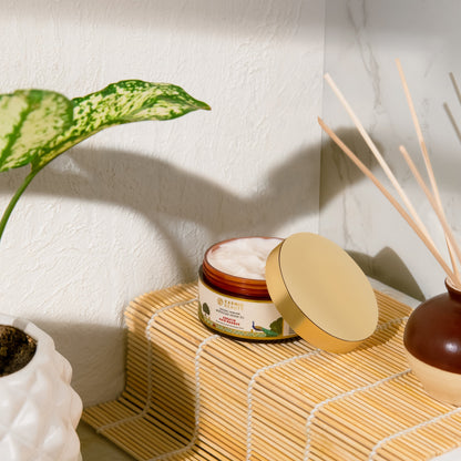 Karmic beauty keratin hair mask with opened lid showing side of the mask jar.