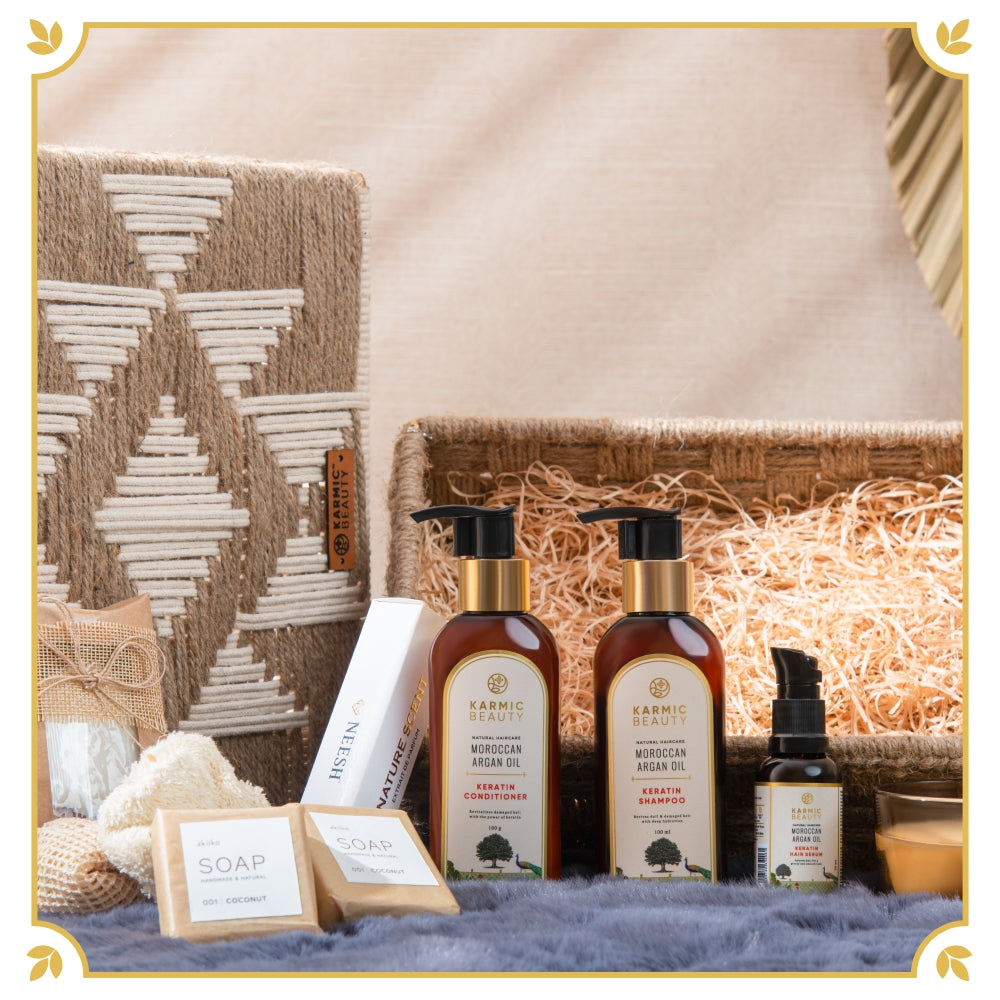 Organic Oasis Basket - A Luxury Gift Hamper for Gifting. Featuring premium hair care, a signature perfume, artisanal soaps, calming candles, and a fragrant wardrobe wax tablet.