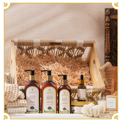 "Self-Care Luxe Caddy featuring premium Shampoo, Conditioner, Hair Masque, Hair Serum, and Argan Oil, complemented by a Wax Candle, Neem Comb, Coconut Soaps, Towel Set, Wax Tablet, Scrunchie, Bath Salt, and Eye Mask, all elegantly arranged in a Crochet Caddy."